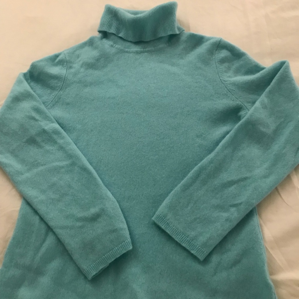 Cashmere light blue sweater, turtle neck.
